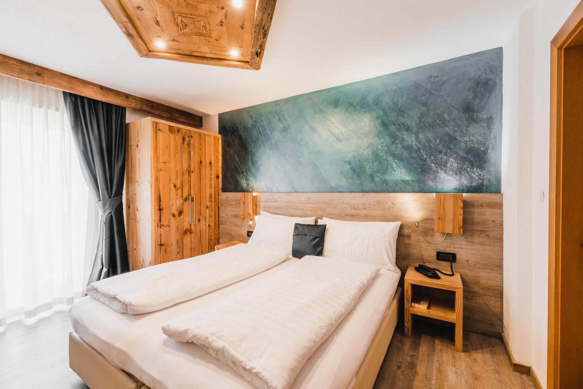 Hotel Arnika ปอซซาดิฟัซซา ภายนอก รูปภาพ