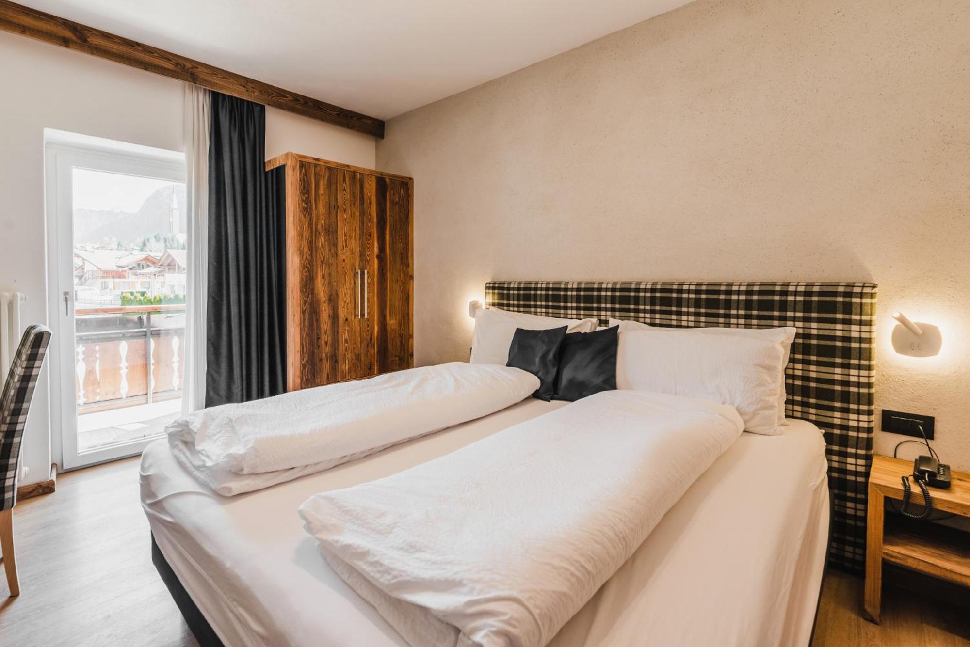 Hotel Arnika ปอซซาดิฟัซซา ภายนอก รูปภาพ