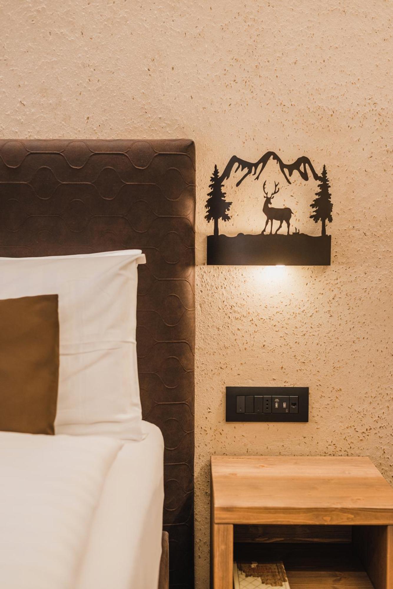 Hotel Arnika ปอซซาดิฟัซซา ภายนอก รูปภาพ